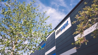 Decorative lettering displaying ebm-papst logo at a corporate building
